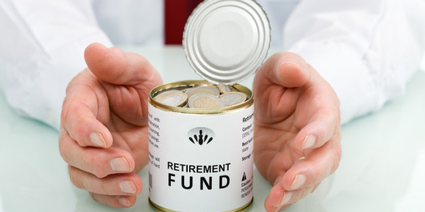 Senior hand protecting retirement fund